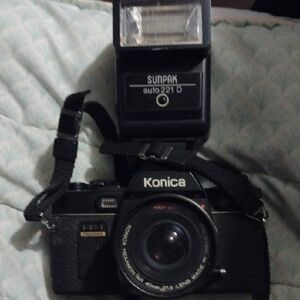 Konica Black Camera with Sunpak Flash